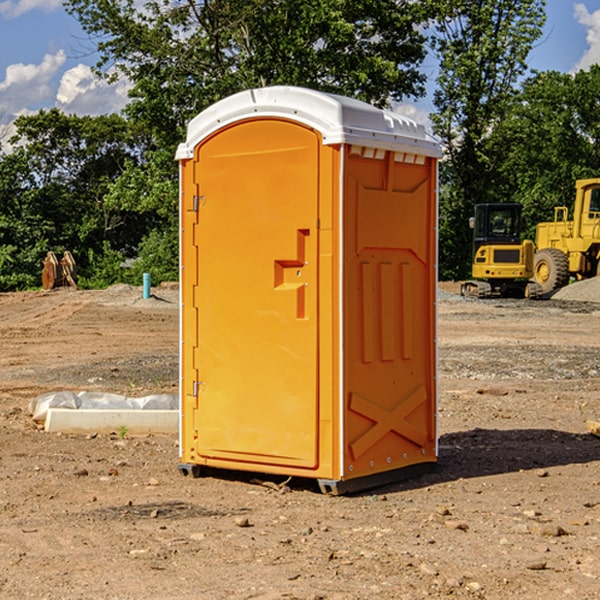 how often are the portable restrooms cleaned and serviced during a rental period in Gans